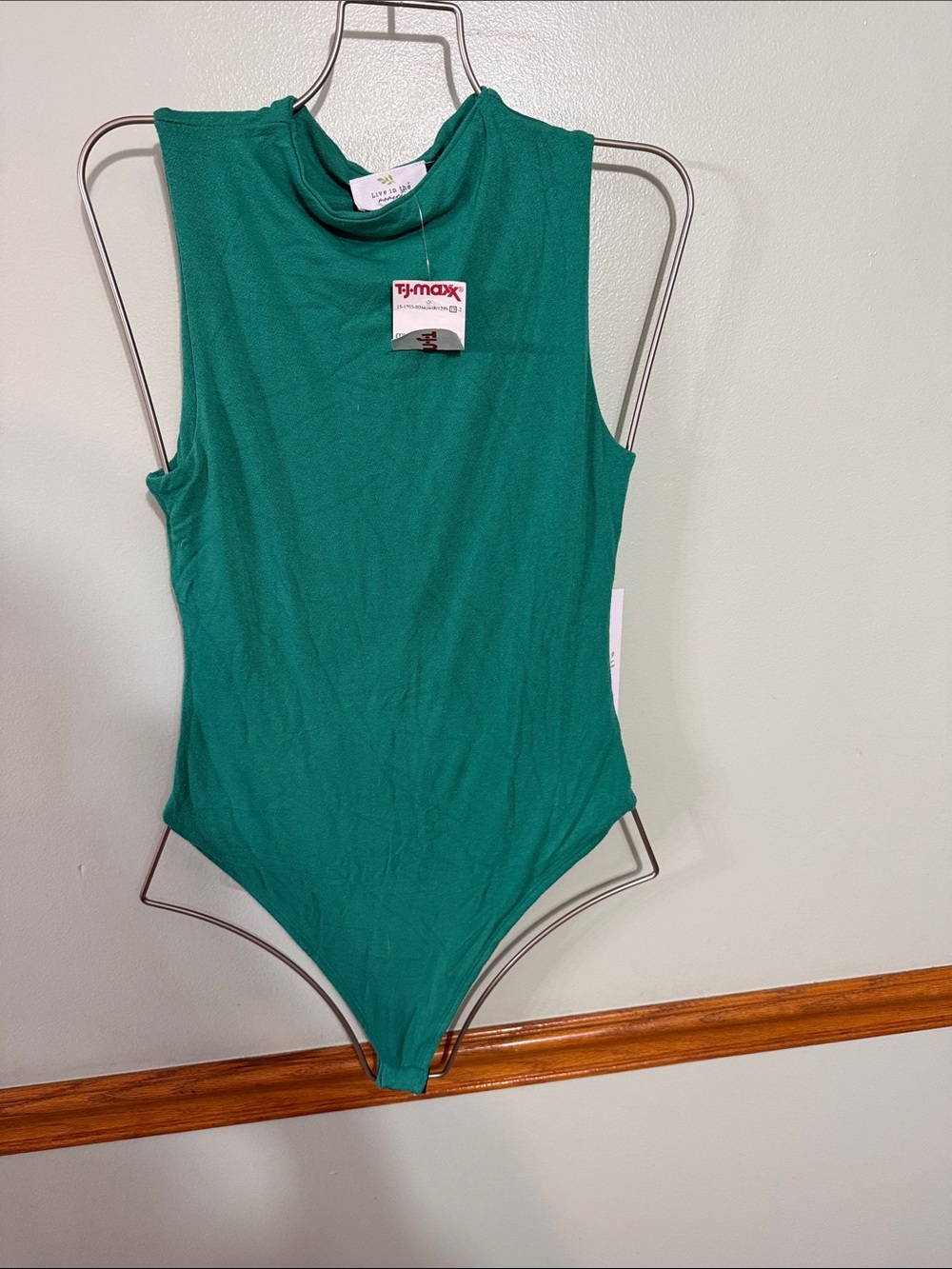 Green High Neck Sleeveless Bodysuit. Size: Medium. NWT